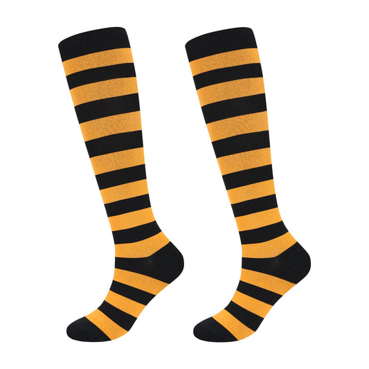 Junely Compression Socks for Women Striped Knee High Stockings for Halloween Running Athletic Nurses Pregnant Women Work Support Travel Flight Sports Gifts Orange and Black